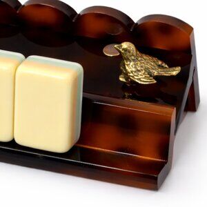 Mahjong Lucky Sparrow - she sits on your rack.  www.mahjwear.com